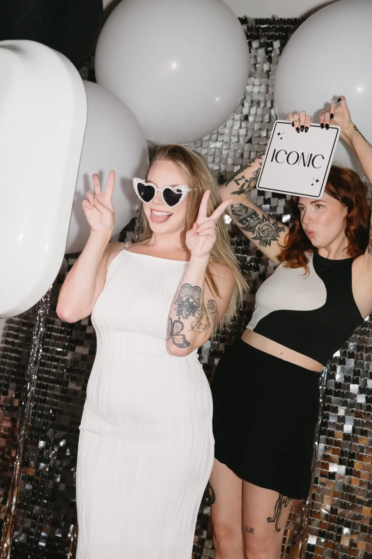 Quinceañera guests enjoying glam photo booth in Los Angeles