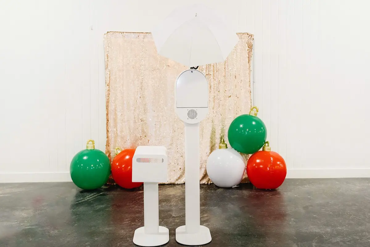 Holiday party photo booth event with festive decorations in LA
